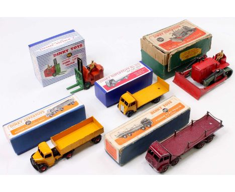 A collection of Dinky Toys including No. 505 Foden Flat Truck with a 2nd type cab in a 1st type box, No. 561 Blaw Knox Bulldo