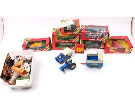 A collection of Britains farming models including No. 9526 Deutz Tractor, No. 9577 Massey Ferguson Seed Drill, No. 9550 Fold 