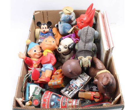 A collection of mixed vintage children's toys including an S.H. Toys of Japan tinplate friction drive "United States" rocket,