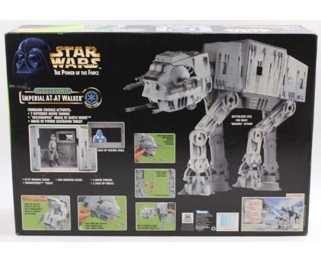 A Star Wars electronic Kenner 1997 boxed Imperial At-At Walker, housed in the original small window hole display card packagi