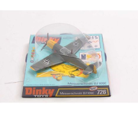 Dinky Toys No. 726 Messerschmitt BF109E, drab greenish-grey, with yellow engine cover, wing tips, and tail, blue undercarriag