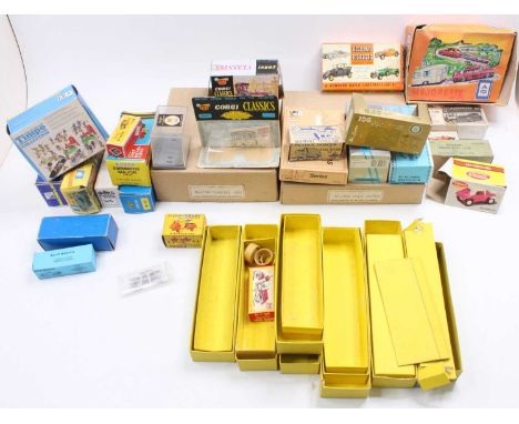 A box containing various mixed empty model boxes, specific examples to include a Majorette counter top outer box, a Lone Star