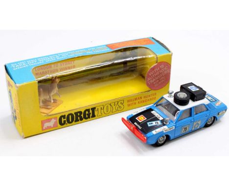 Corgi Toys No. 302 Hillman Hunter Rally Car, blue body with white roof, matt bonnet, RN75, with equipment to roof, partially 