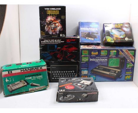 One box containing an interesting selection of vintage video games, consoles, and accessories to include a Sinclair ZX8I pers