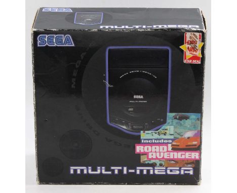 A Sega Multi-Mega console unit, housed in the original two-tier card Road Avenger box, comprising of console, various leads, 