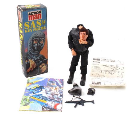 A Palitoy Action Man SAS Key Figure with uniform, weapon, and original Palitoy Action Man Poster, alas his head is detached, 