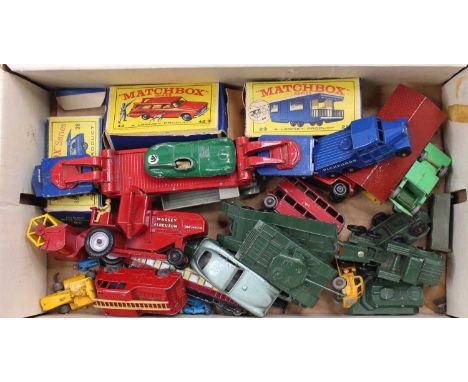 A tray containing a small collection of loose and boxed Matchbox Lesney diecast models, with specific examples including a bo