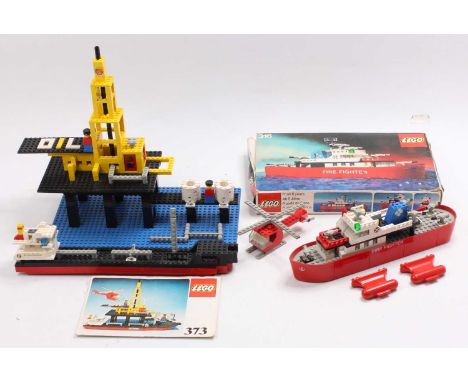 A Lego part-boxed and loose construction kit group to include No. 373 oil rig, part built example, complete with instruction 