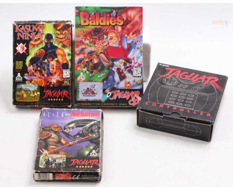 A collection of Jaguar related boxed games and accessories to include a Jaguar controller, a boxed and sealed Jaguar CD Baldi