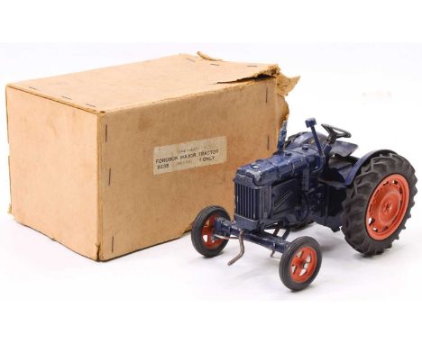 A Chad Valley No. 9235 Fordson Major tractor comprising dark blue body with orange hubs, with Chad Valley decal to the unders