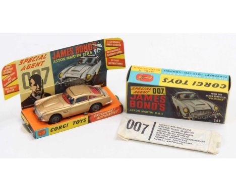 A Corgi Toys No. 261 James Bond Aston Martin DB5 comprising of gold body with red interior, working mechanisms and cast wire 