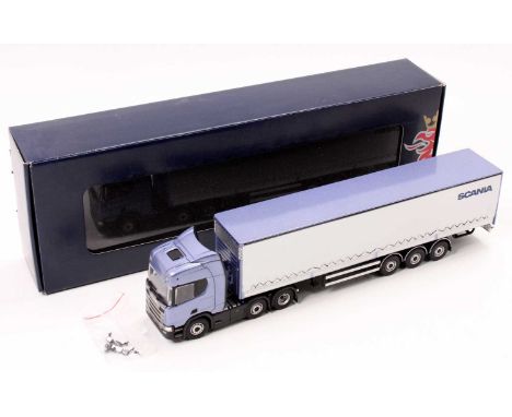 Tekno Scania 1/50th scale dealer promotional boxed No.2560946 model of a Scania R500 Tractor Unit with curtain side semi-trai