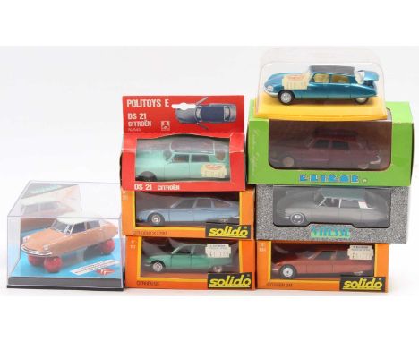 A collection of Citroen 1/43rd scale diecast model cars, with specific examples including a Politoys No. 545 Citroen DS 21, a