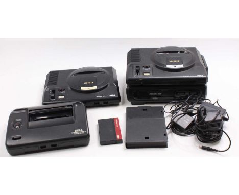 A collection of Sega related loose consoles to include a Sega Mega Drive with Mega-CD extra, a Sega Mega Drive 16-bit console