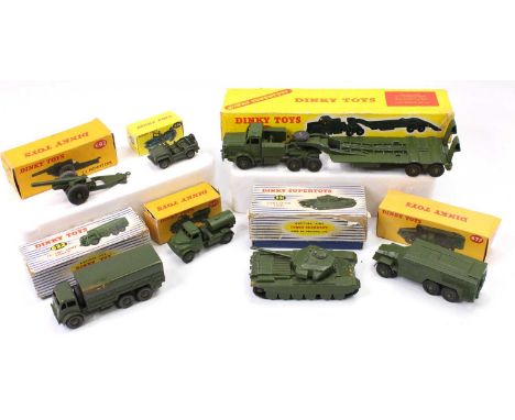 A collection of Dinky Toys military vehicles including No. 660 Tank Transporter, No. 622 10-Ton Army Truck, No. 651 Centurion