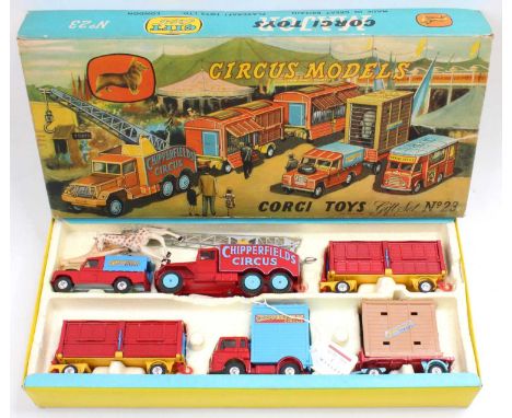 Corgi Toys Gift Set No. 23 Chipperfields Circus comprising booking van, circus crane truck, two animal cage wagons, LandRover