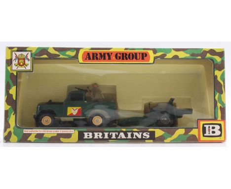 A Britains No. 9787 Army Group series Army Landrover and gun, housed in the original camouflage style window display box