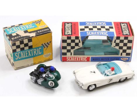 A boxed Scalextric slot car group to include a No. C/75 Mercedes Benz race car comprising of white body with driver figure an