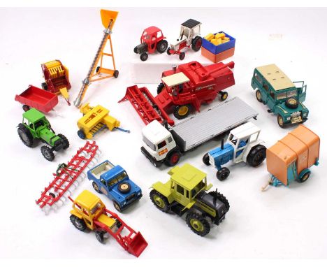 A collection of Britains Farm models and accessories including a No. 9523 Ford 7710 Tractor, No. 9527 Fiat Half Track Tractor