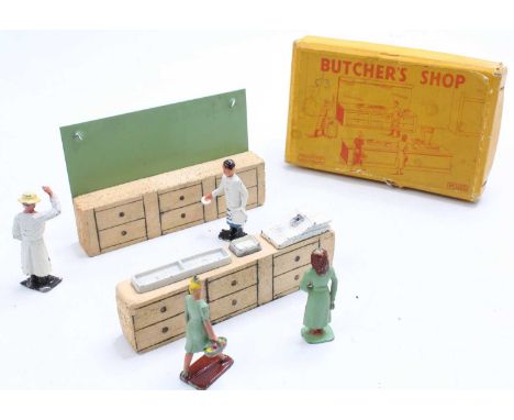 Crescent No.1230 Butchers Shop, tin and wooden back drop, wooden block counter, with butcher figure and assistant, 2 customer