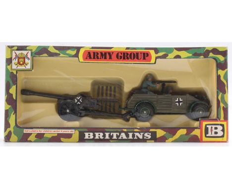 A Britains No. 9788 Army group series Kubelwagen and German field gun housed in the original camouflage style window packagin
