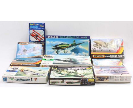 A collection of various 1/72nd scale aircraft model kits, with examples including a Matchbox Tornado F3, A Heller Hawker Temp