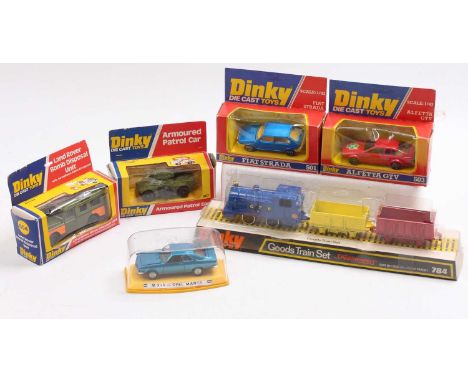 Dinky Toys boxed model group comprising No. 604 Land Rover Bomb Disposal Unit, No. 667 Armoured Patrol Car, No. 784 Goods Tra