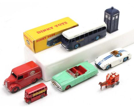 A collection of Dinky Toys comprising a boxed No. 283 B.O.A.C. Coach (E-BG), No. 132 Packard Convertible, No. 450 Trojan "ESS