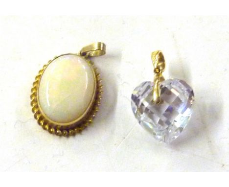 A 9ct gold and opal set pendant; and a 14ct gold mounted pendant 