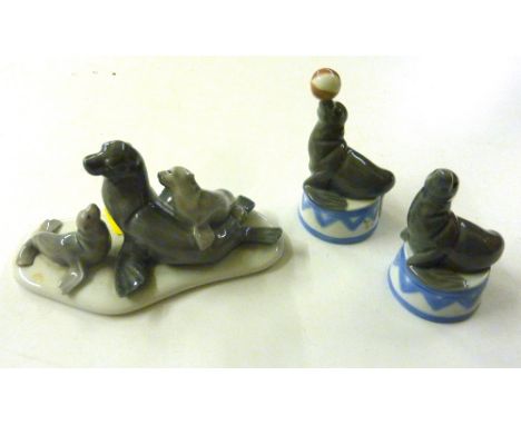 Three Lladro ornaments, each in the form of sea lions 
