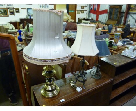 A large brass table lamp and shade; and two other table lamps 