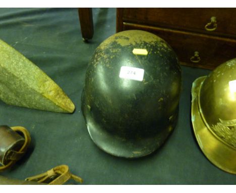 A German WW2 helmet complete with lining 