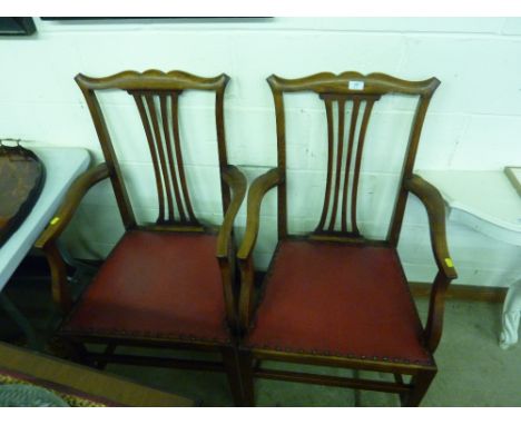 A pair of Chippendale style carver chairs 
