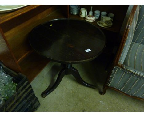 A 19th Century circular topped tripod table 