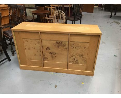 Contemporary light oak sideboard with three panelled doors