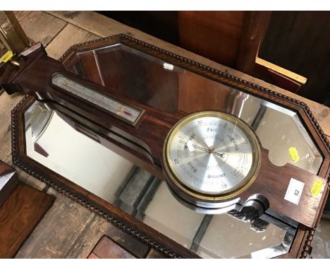 Wall barometer and an oak framed wall mirror