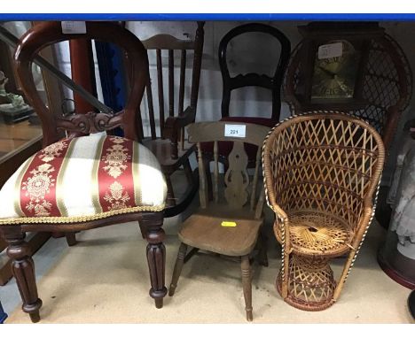 Six miniature wooden and wicker chairs, the largest measuring 18 inches height, and a miniature longcase clock