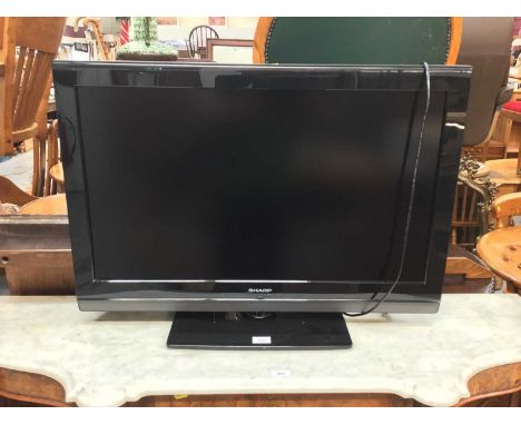 Sharp flatscreen television - model no LC-32SH7E-BK with remote control
