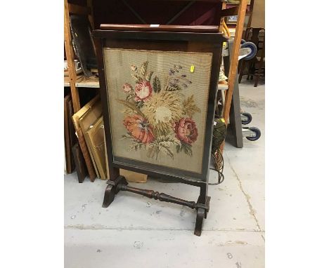 Victorian firescreen with floral embroidered panel in mahogany frame on splayed legs