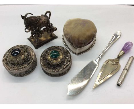 Silver mounted pin cushion, trowel book mark, silver propelling toothpick, silver fish knife and other items 
