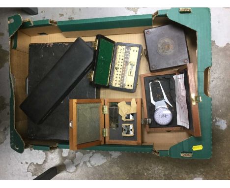 Box of vintage scientific and measuring instruments