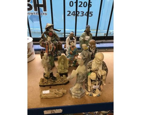 Collection of oriental figures, including ceramic and hardstone examples