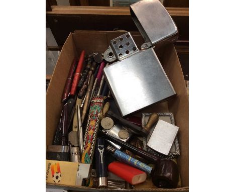 Large Zippo style lighter, others lighters, pipe, various pens, penknives, cut throat razors and sundries 