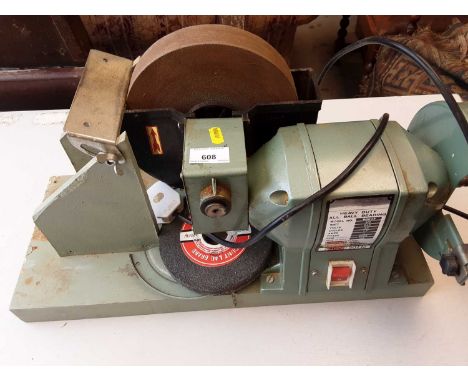 Electric bench grinder and an electric rotary sander
