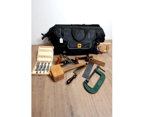 A JCB TOOL BAG CONTAINING MISCELLANEOUS TOOLS INCLUDING PLANES CLAMPS AND JOSEPH MARPLES PIECES ETC
