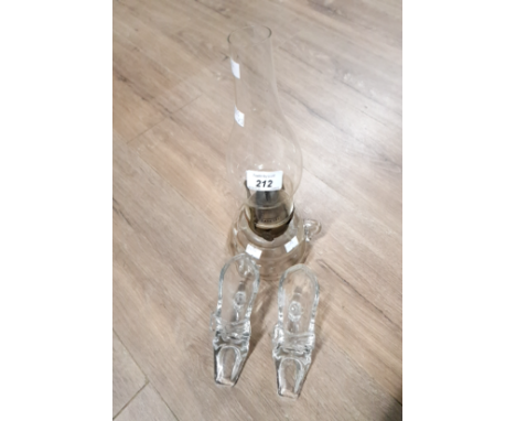 A VICTORIAN GLASS OIL LAMP TOGETHER WITH TWO GLASS SHOES