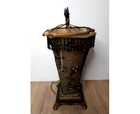 A ORNATE TABLE LAMP