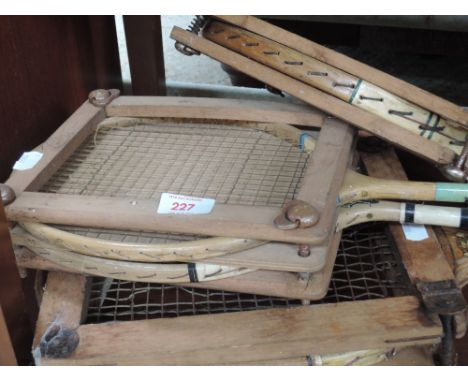 Two vintage tennis rackets and two badminton rackets with head frames