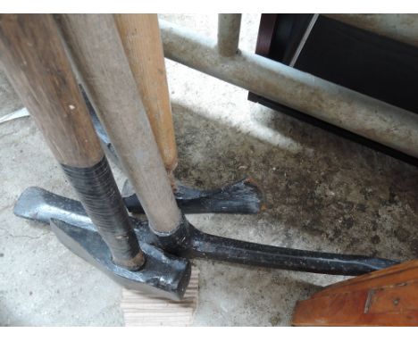 A selection of tools including Axe, Sledgehammer and log splitter