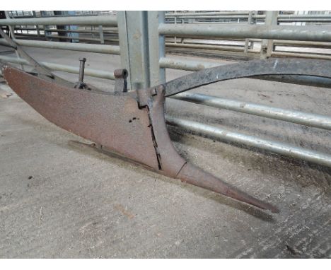 A vintage horse drawn plough